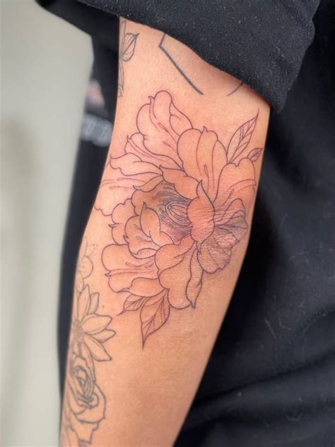 Flower Elbow Tattoo Designs