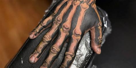 Hand Bone Tattoo Designs